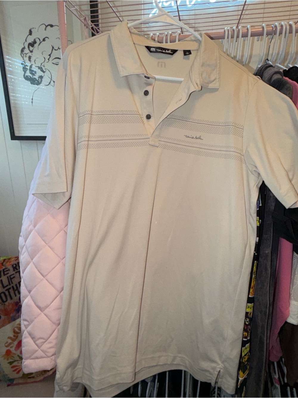 TravisMathew Men's Light Beige Polo with Perforated Chest Stripes